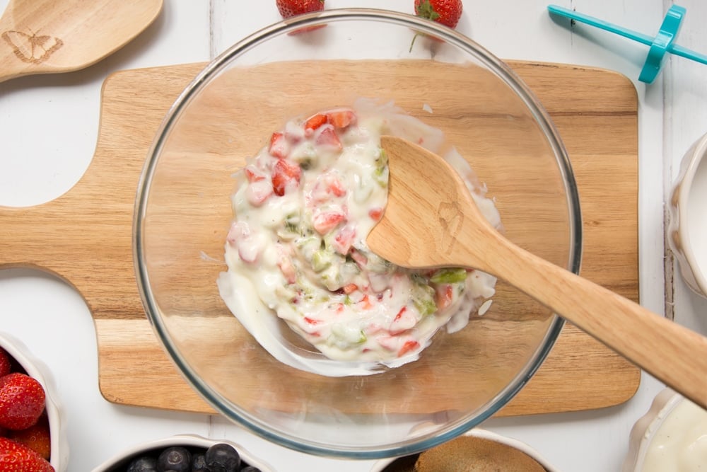 Strawberries, kiwi and vanilla yogurt are mixed together to create a refreshing frozen treat