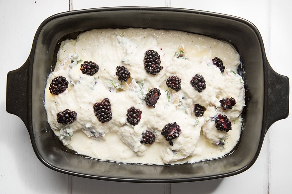 The ricotta blackberry stuffed giant pasta shells is topped with blackberries