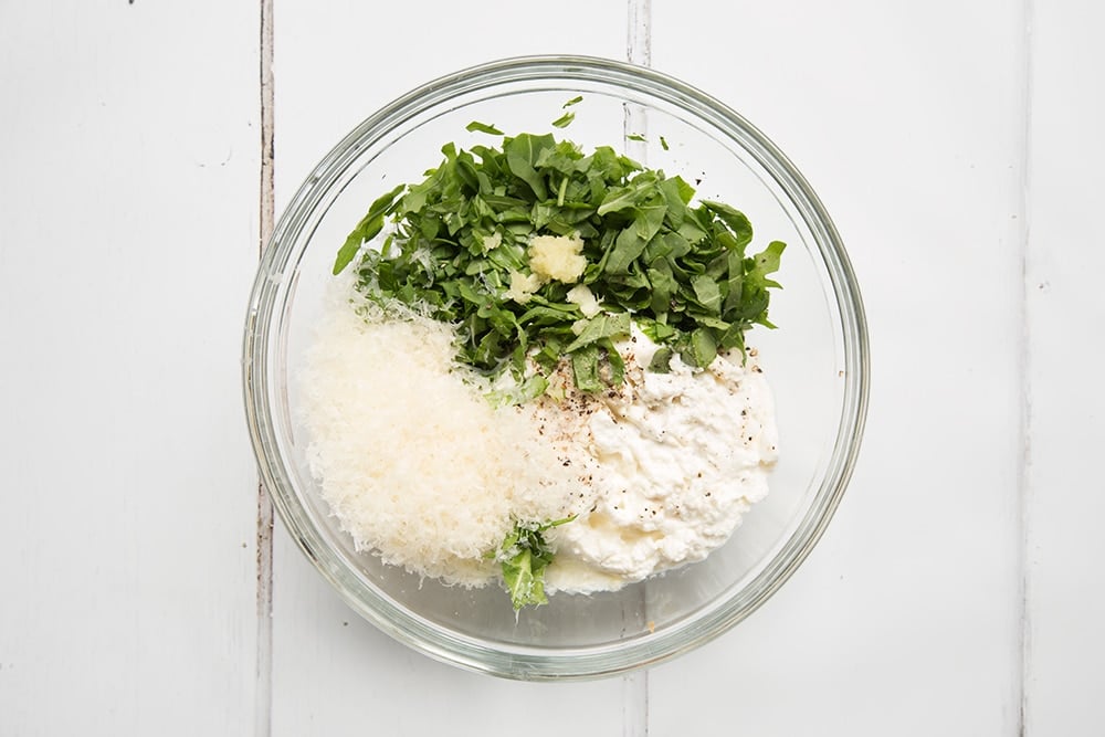 Preparing the ricotta filling for the giant pasta shells
