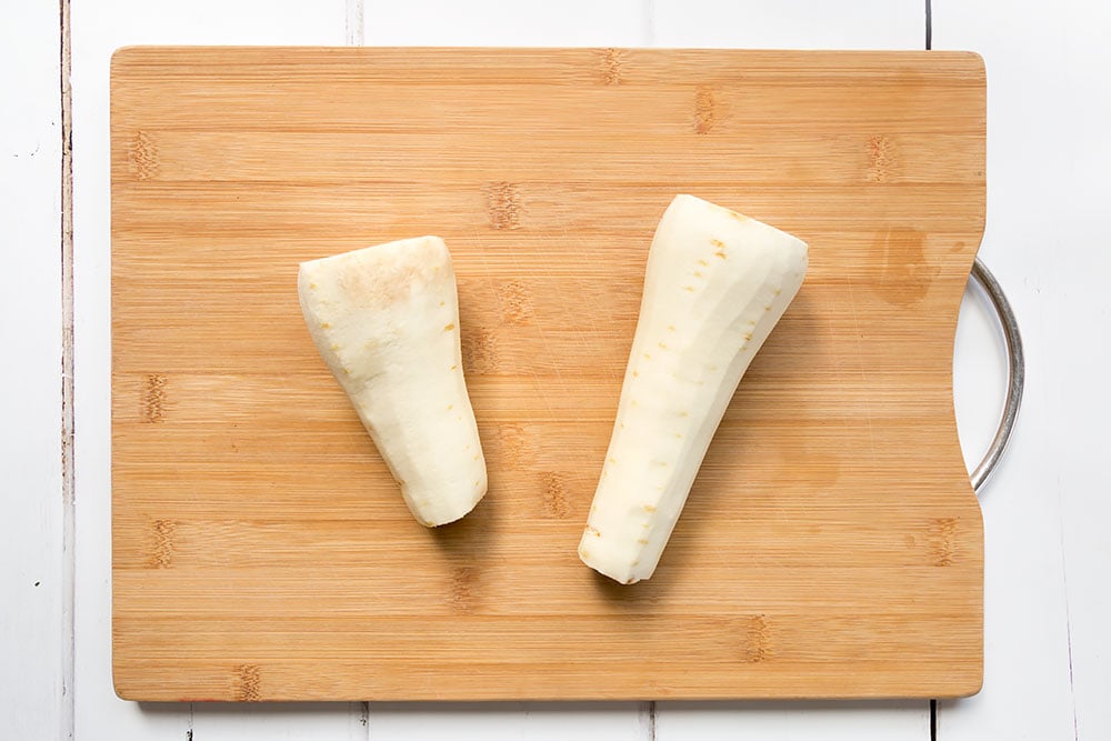Preparing the parsnips on a chopping board