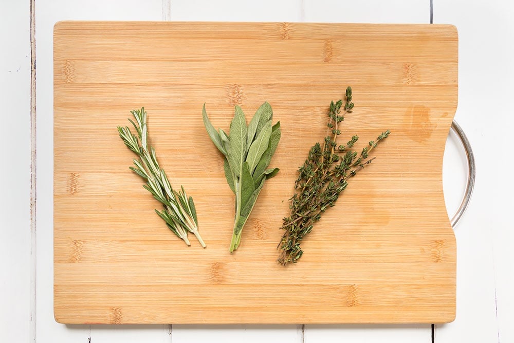 Rosemary, thyme and sage help flavour the chicken