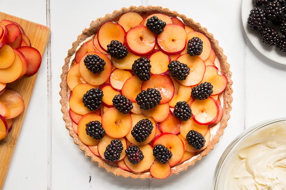 The tart is then topped with blackberries