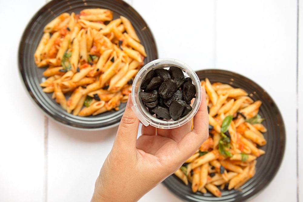 Penne alla black garlic vodka topped with slivers of black garlic