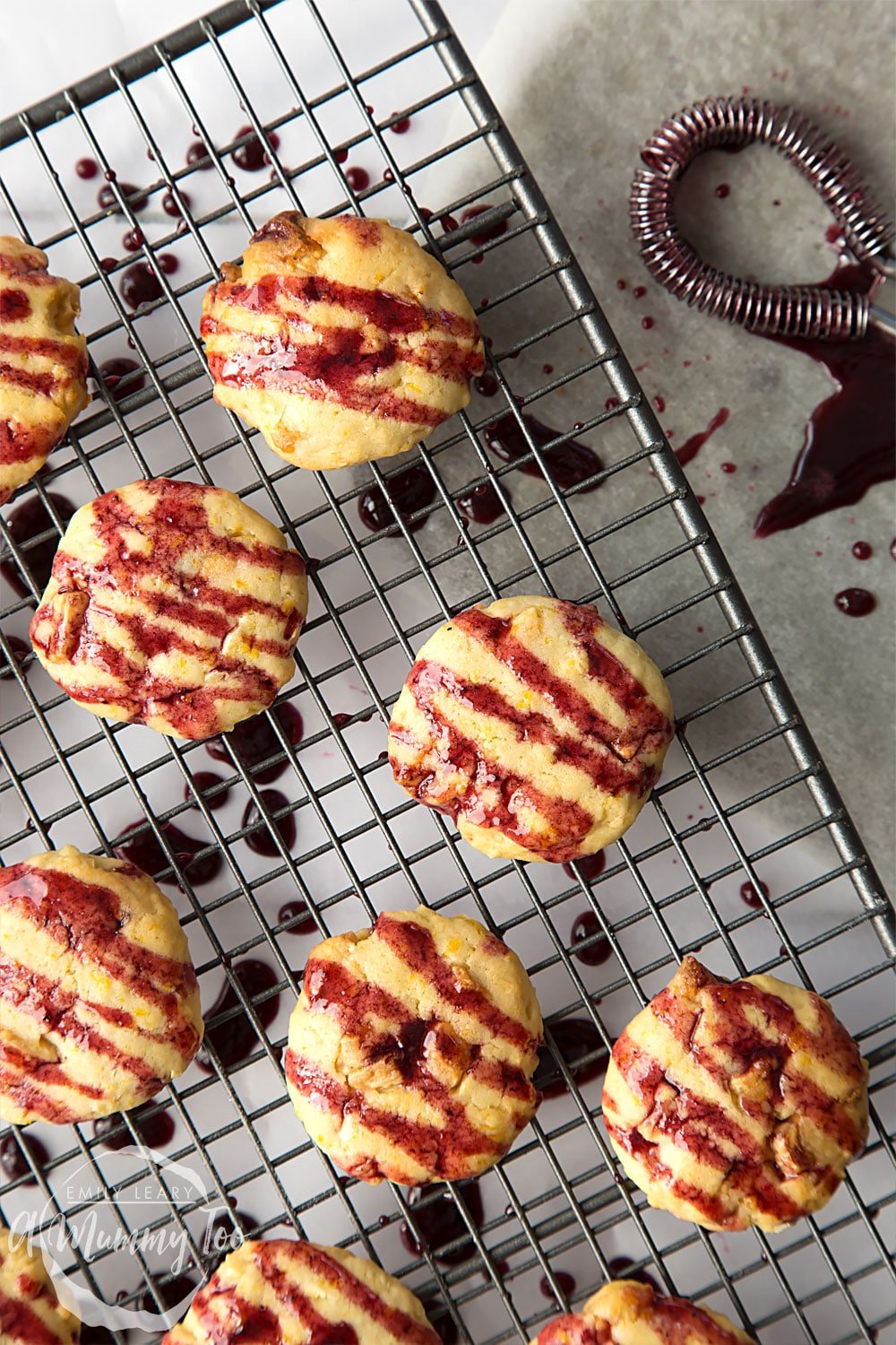 Lots of sweetcorn and white chocolate cookies with blackberry glaze