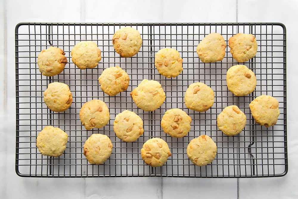 Sweetcorn and white chocolate cookies cooling on a wire rack