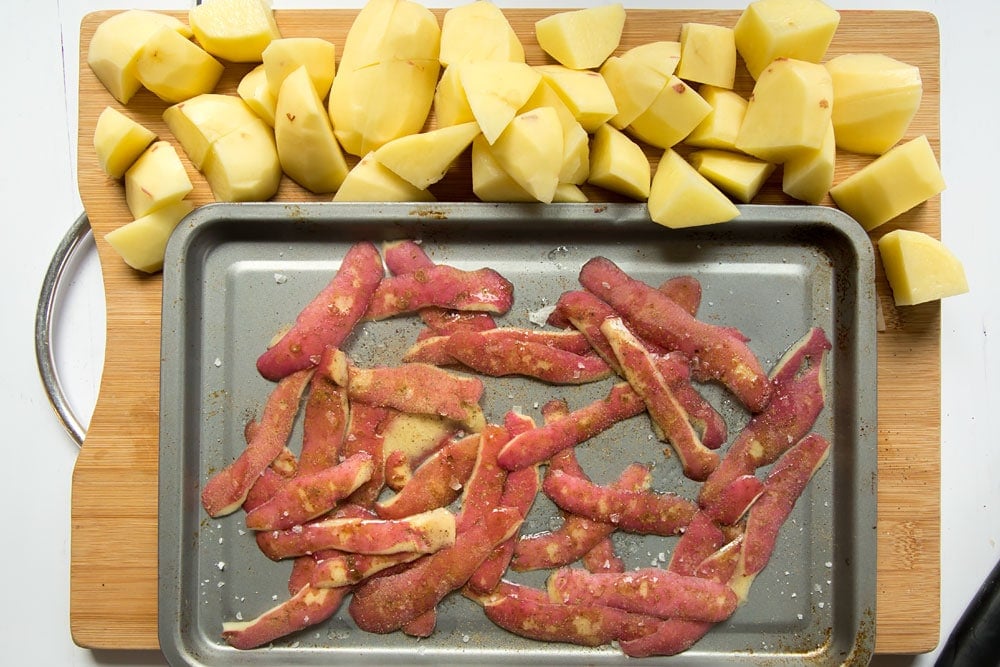 Preparing the potato skins to become 'fries'