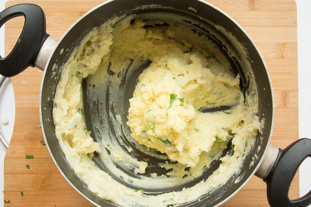 Parsley is mixed into the root mash