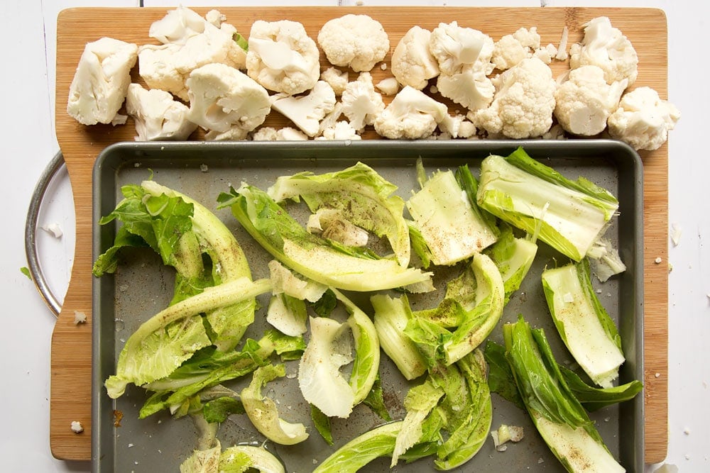 Preparing the roasted cauliflower greens