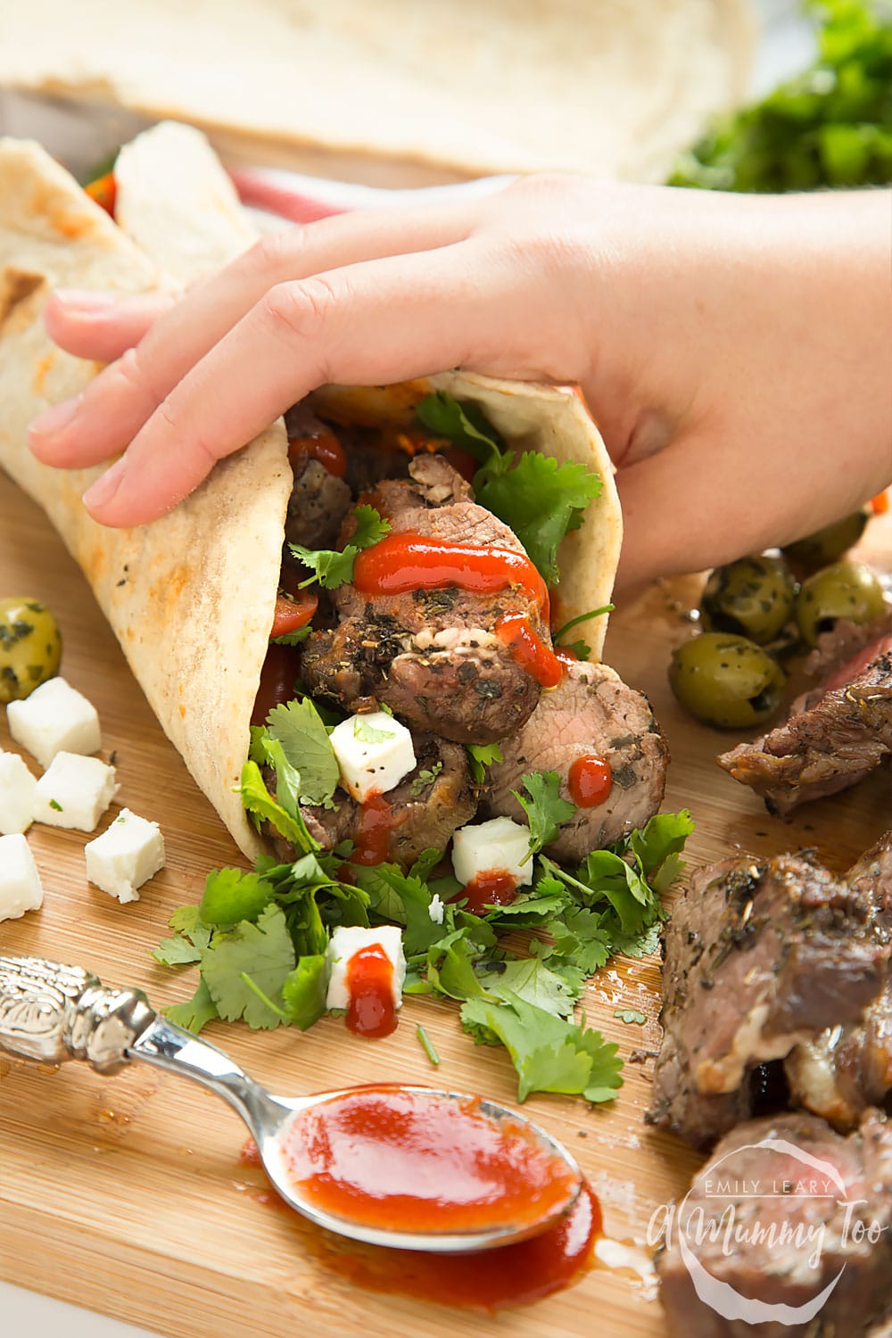 A delicious herb crusted Welsh Lamb in a quick coriander flatbread wrap, shown ready to eat