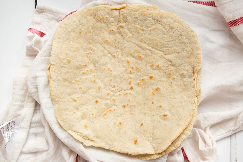 Freshly cooked flatbreads, ready to assemble the Welsh Lamb wrap