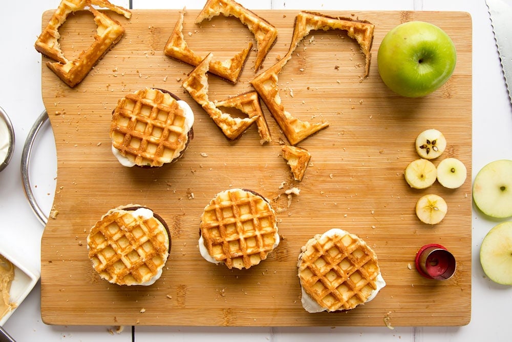 Assembling the waffle apple burgers