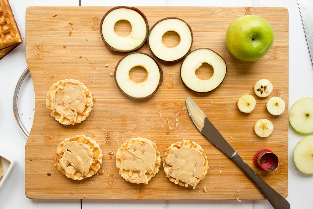 Adding peanut butter to the waffle buns