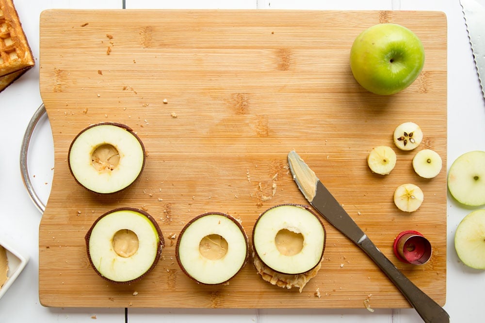 Assembling the waffle apple burgers