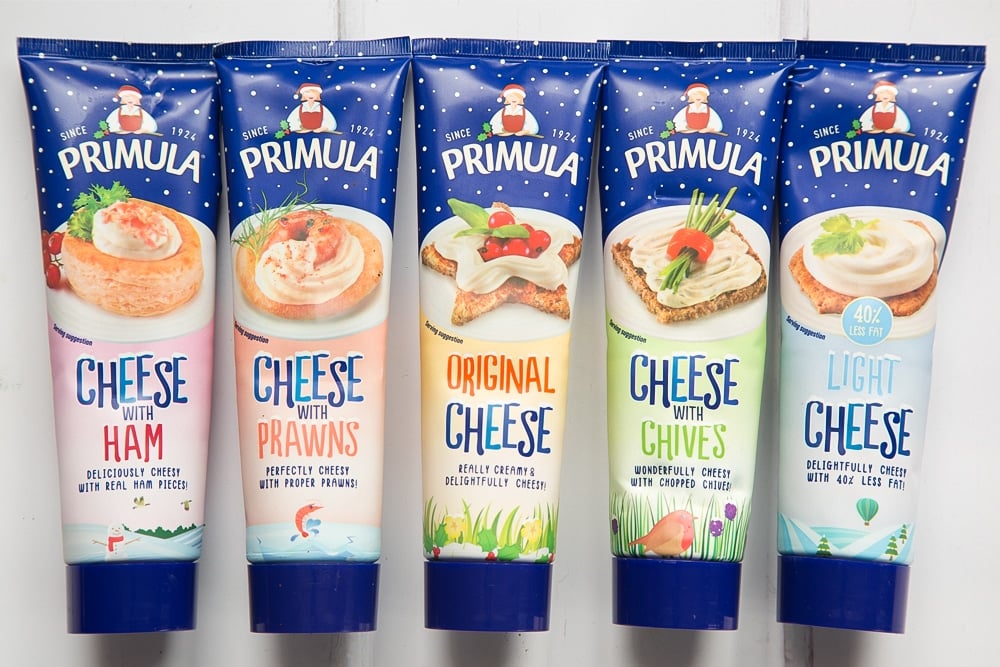 A selection of Primula cheese in festive packaging