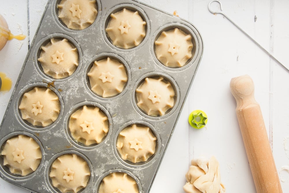 Skewer the mince pies to allow air to escape when cooking