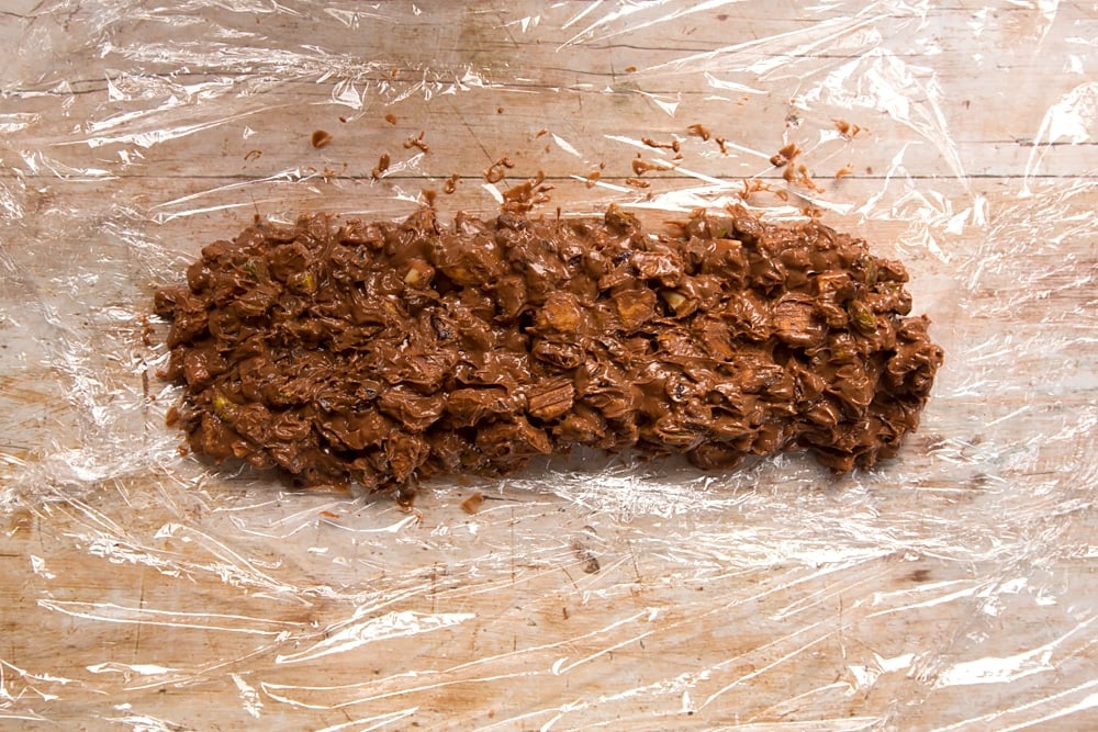 Lay the Christmas spiced chocolate salami mixture on top of cling film