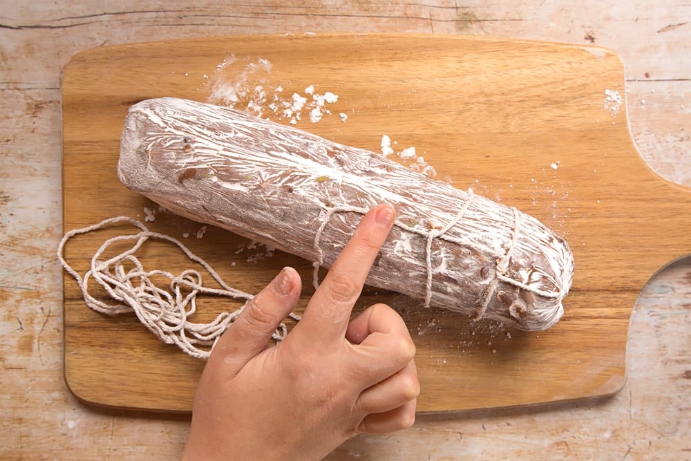 Preparing the Christmas spiced chocolate salami 