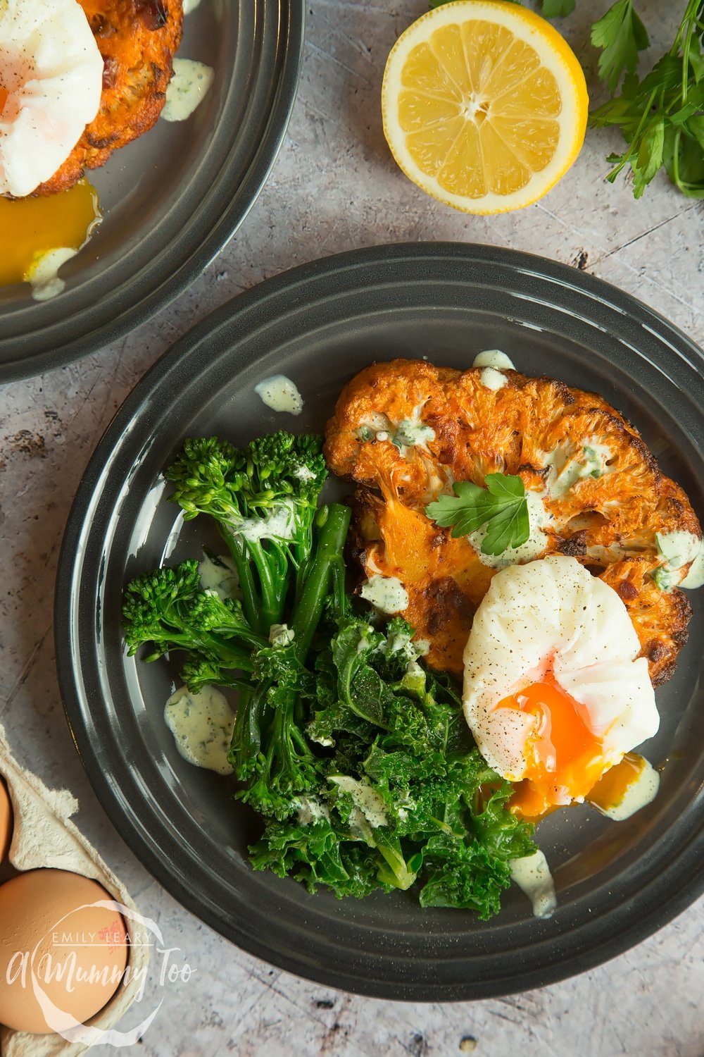 This cauliflower "steak" and eggs breakfast features sliced cauliflower marinated with harissa and goat's yogurt, for a delicious alternative to a traditional poached egg breakfast