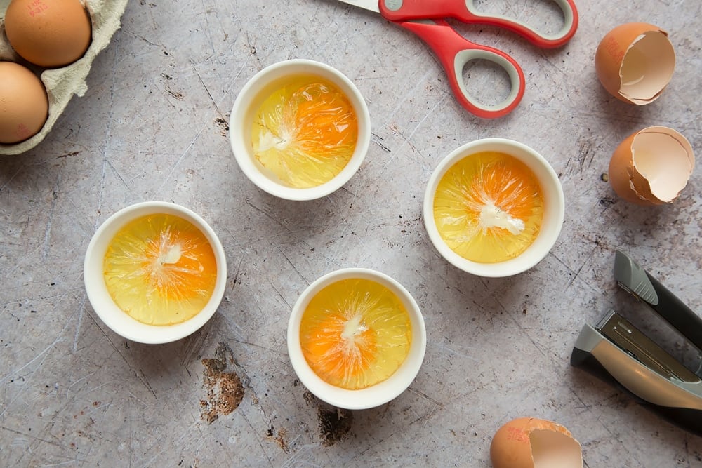 Preparing the poached eggs for the dish