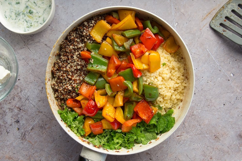 The other ingredients for the aromatic lamb and warm grain salad are added to the pan