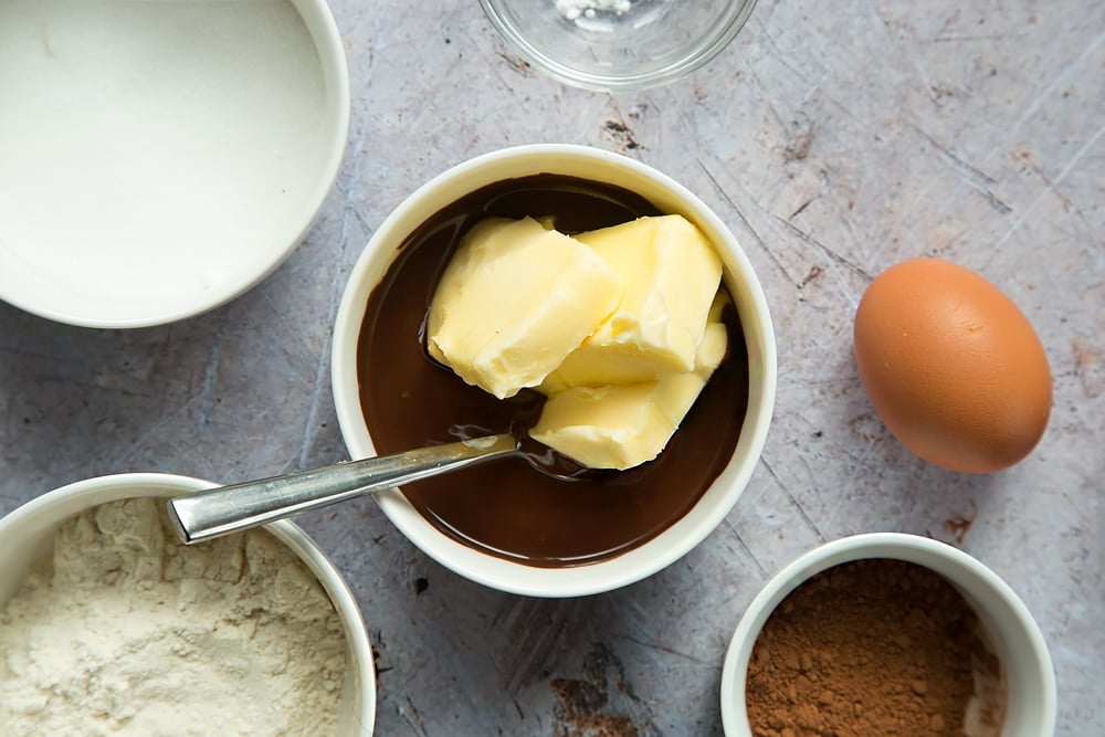 Butter is added to the melted chocolate