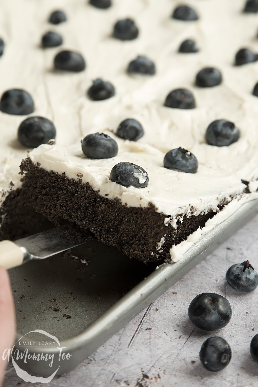 Close up of the black velvet sheet cake being served