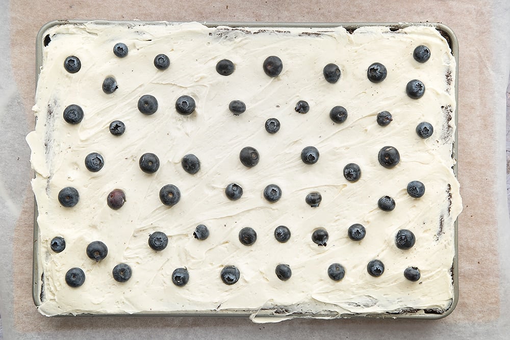 Black velvet sheet cake, topped with blueberries