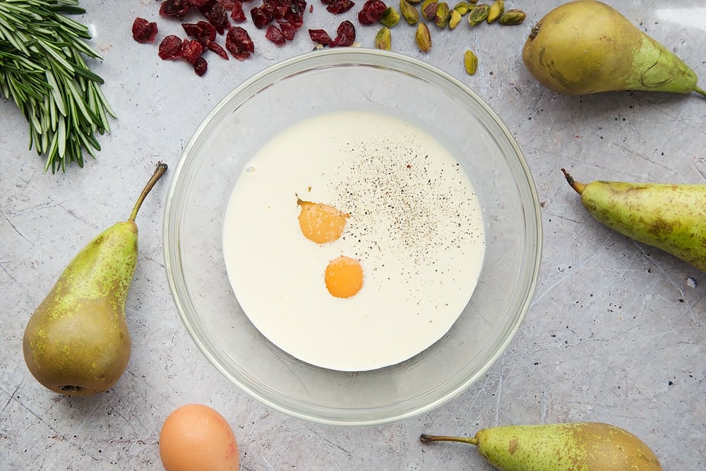 Cream, egg yolks and salt are mixed together in a bowl