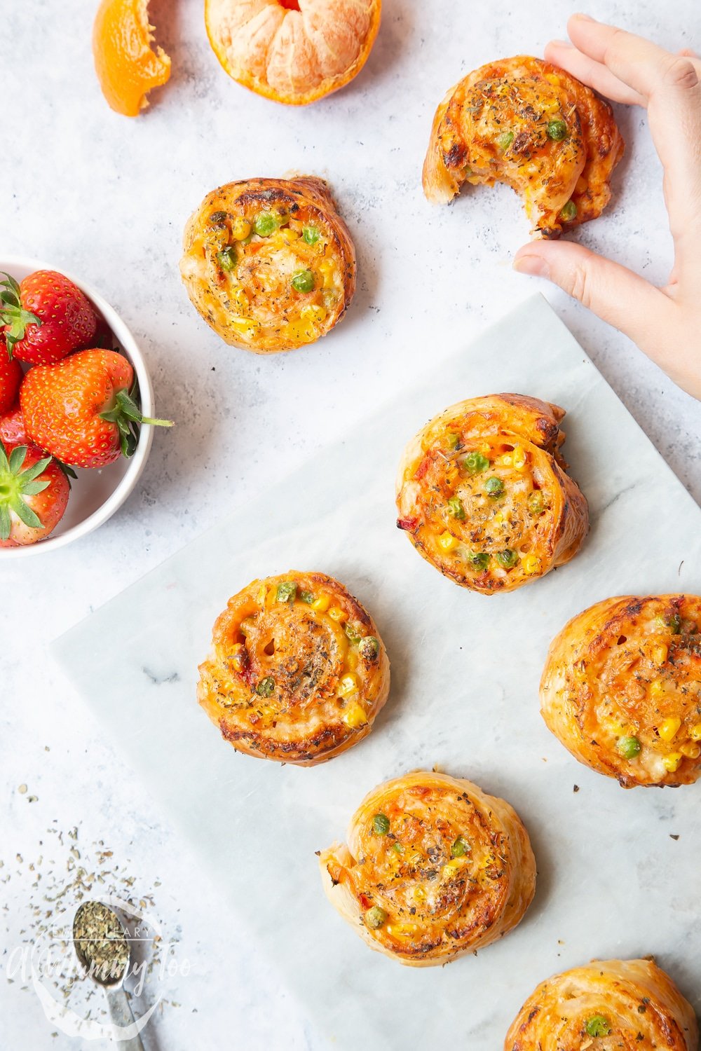 Veggie pizza roll-ups made with pastry, tomato puree and delicious veggies! Great for even the fussiest of eaters.