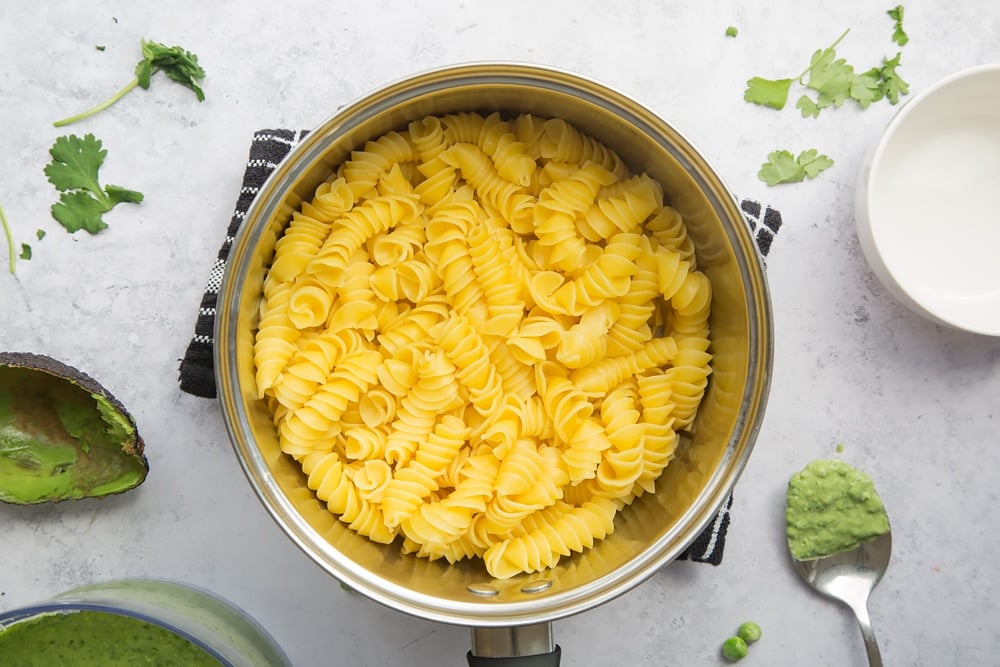 Pasta cooking in a large pan of water