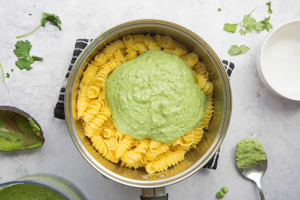 Pour the green pasta sauce over cooked pasta