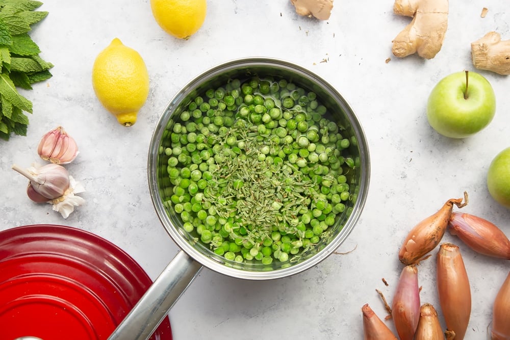 Peas and tarragon in a saucepan