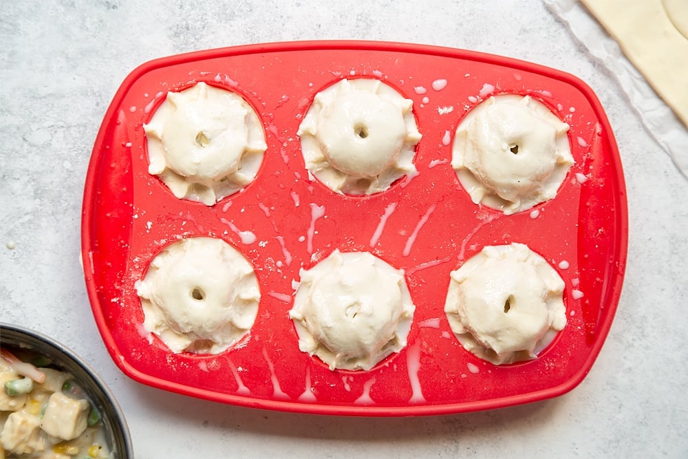 The creamy tofu and vegetable vegan mini pies are now ready to bake