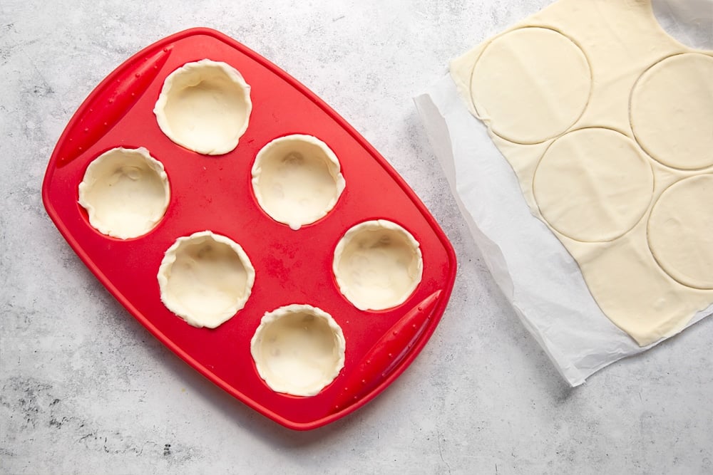 Mini pie cases in a muffin tray