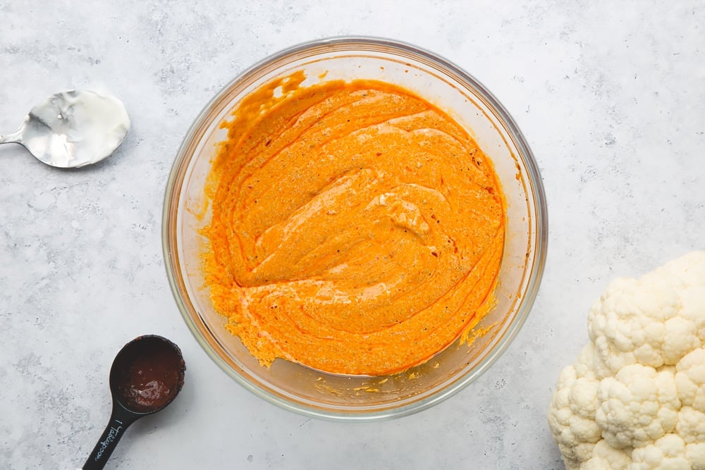 Preparing the harissa sauce for the cauliflower