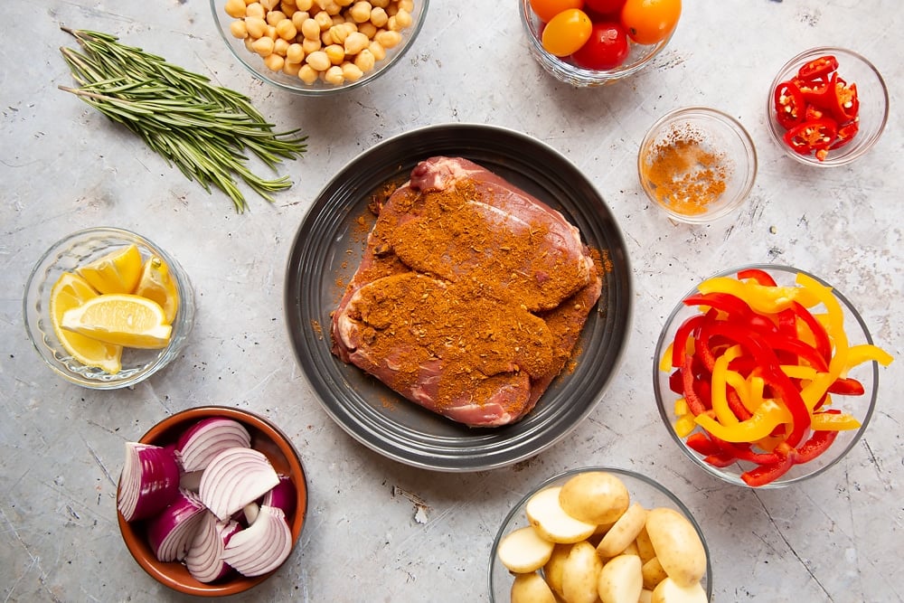Seasoning the lamb with ras el hanout