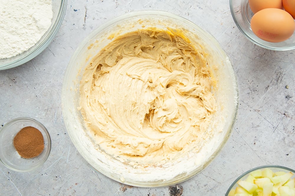 Mixing ingredients together for this apple, cinnamon and honey cake