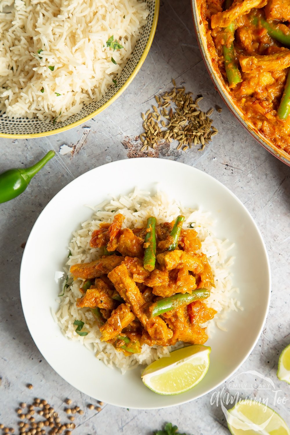 A plate shown with a serving of South Indian coconut-pork curry