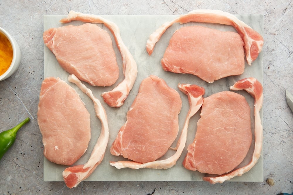 Removing the fat from the pork