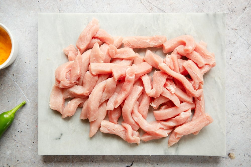 Pork cut into strips ready to make the curry