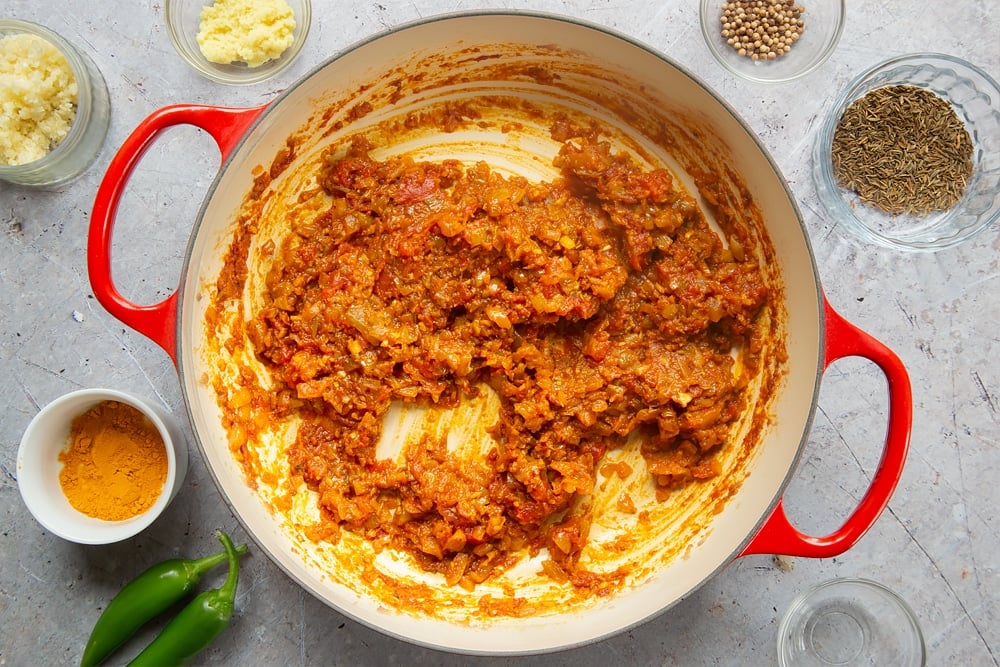 Letting the curry sauce thicken in the pan