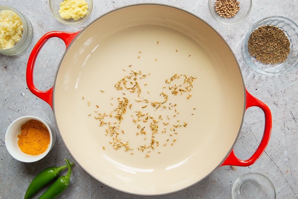 Add fennel seeds and chilli to the oiled pan 