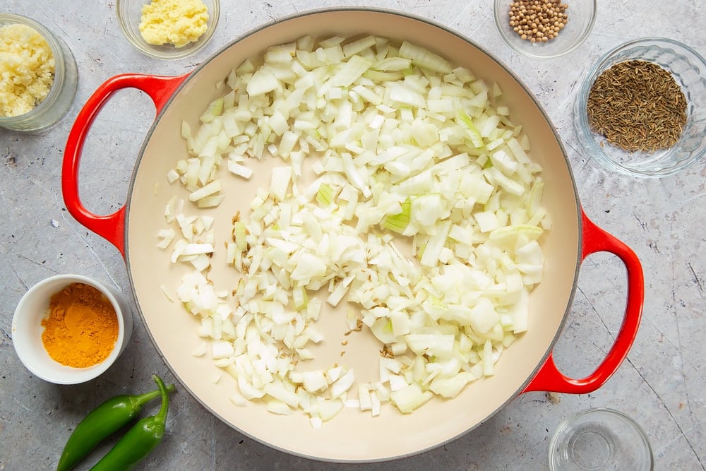 Chopped onions heating in the frying pan