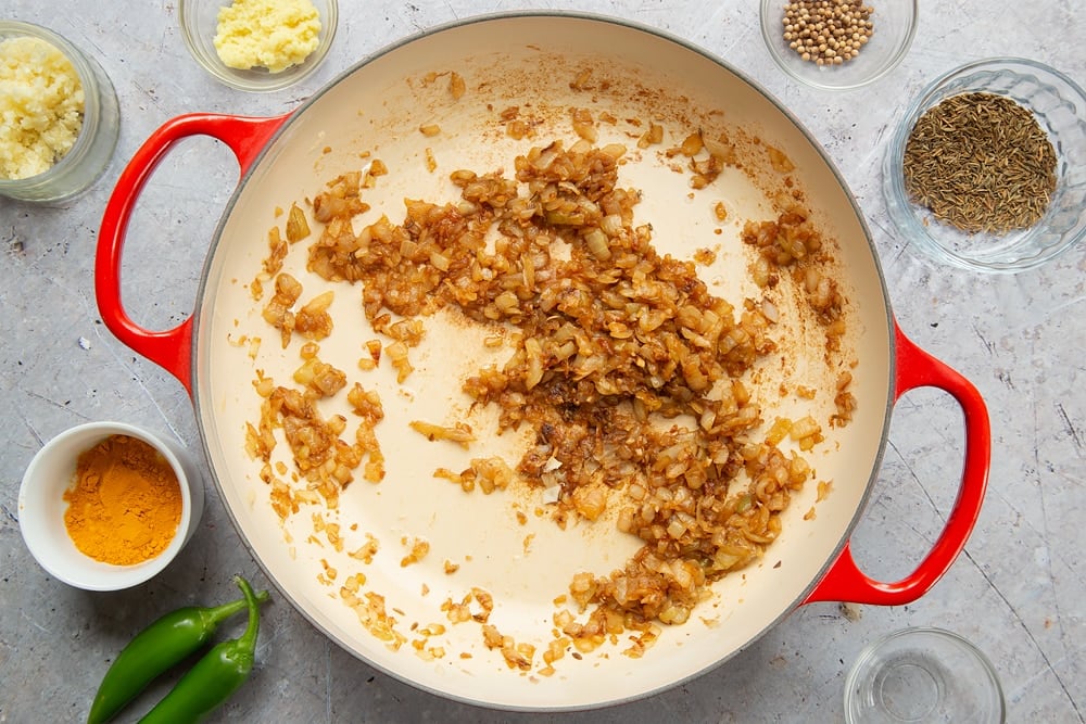 Preparing the coconut-pork curry