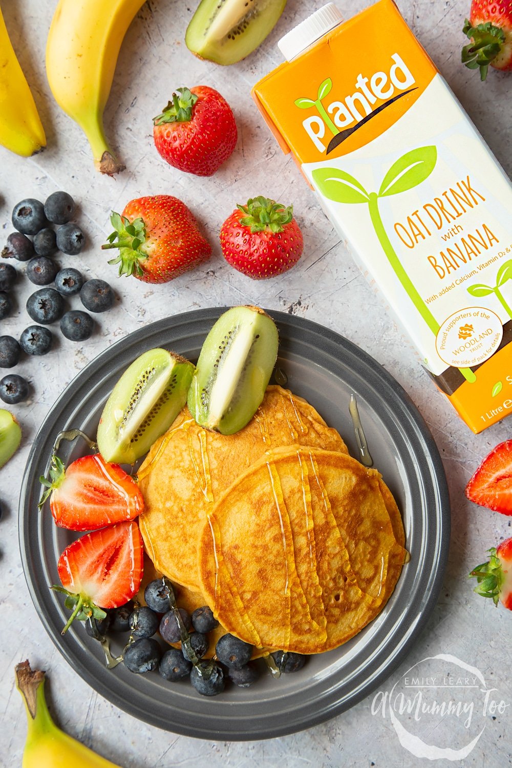 Sweet potato pancakes served with fresh fruit, made with Planted oat drink with banana