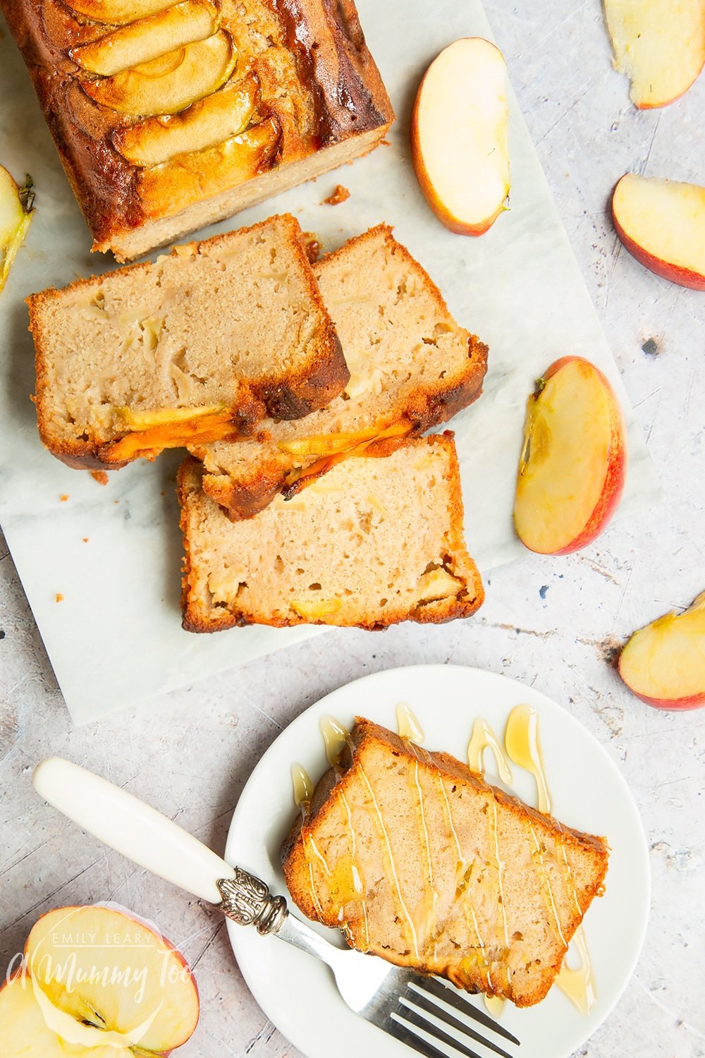 A sliced apple, cinnamon and honey cake