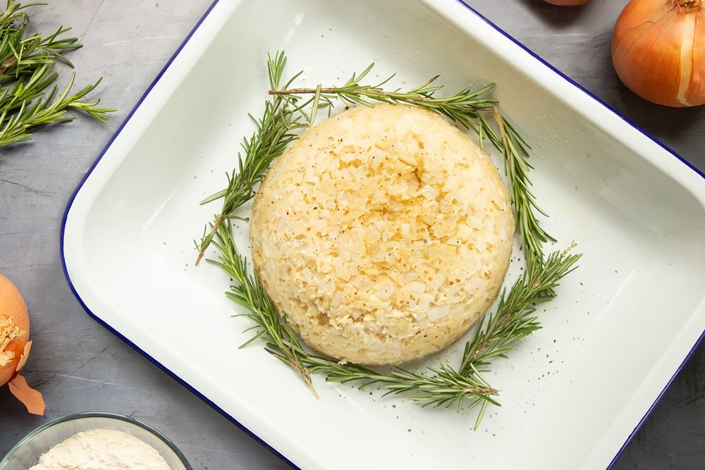 Turn your onion pudding out into a baking dish, and dress with sprigs of rosemary