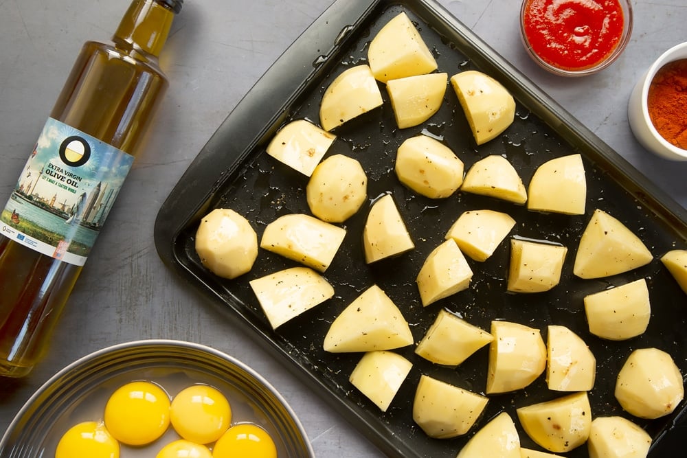 Diced potatoes drizzled with extra virgin olive oil