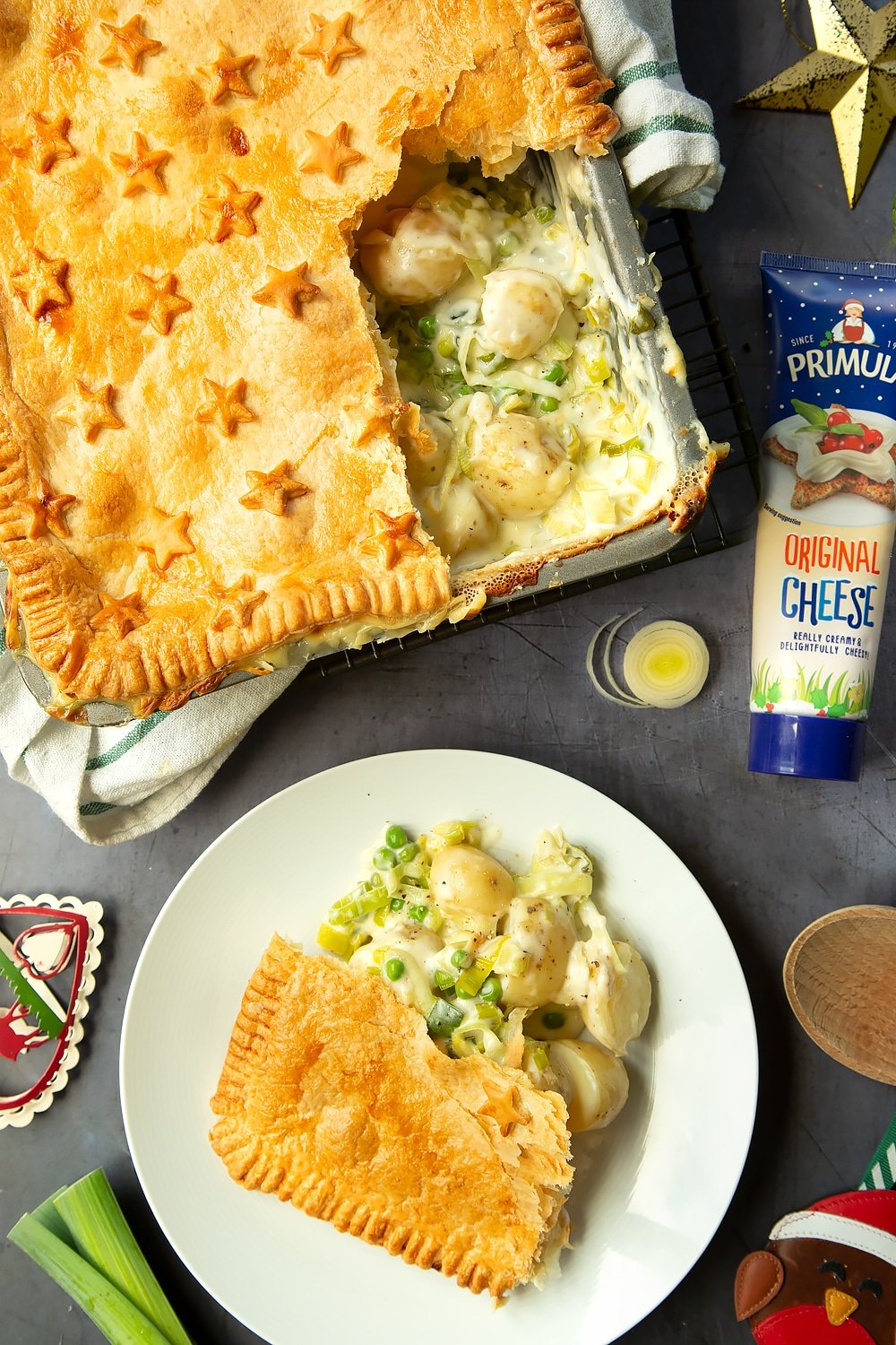 Cheesy leek and potato pie, shown served on a plate next to Primula Cheese