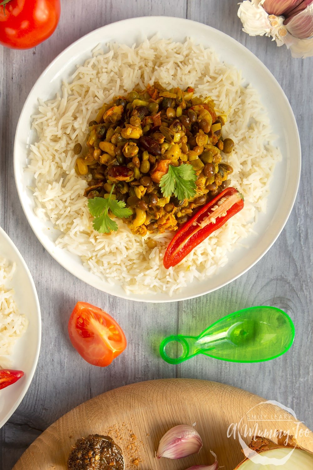 Fiery lentils and beans served with rice